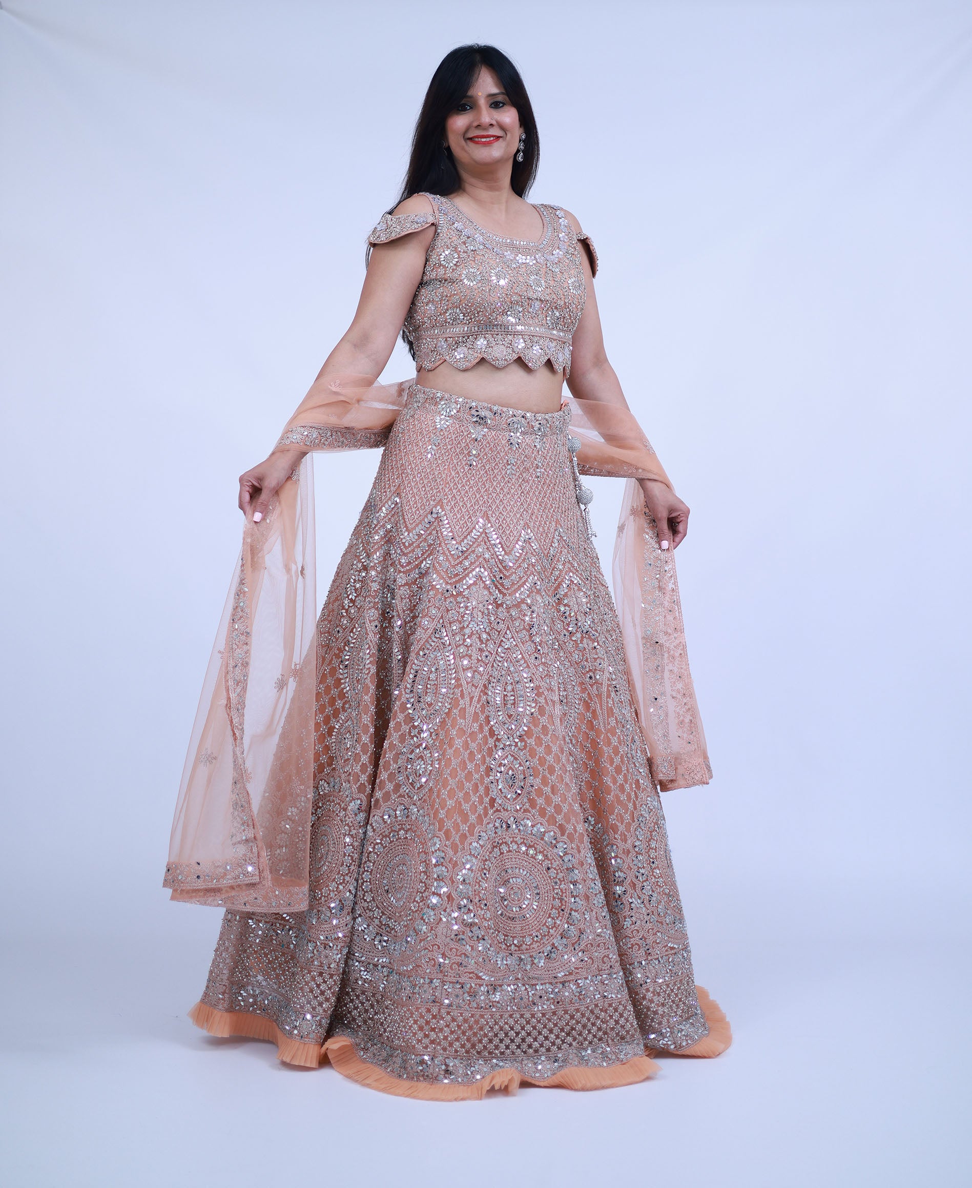 Pastel Peach Lehenga with real mirror work