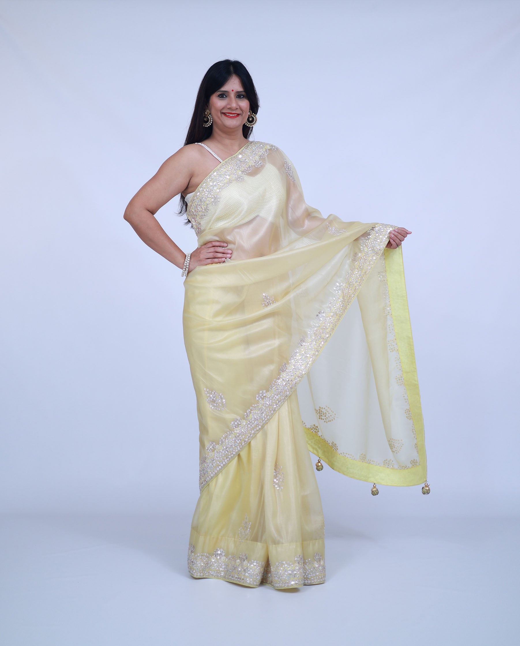 Pastel Lemon Yellow Organza Saree with unstitched blouse