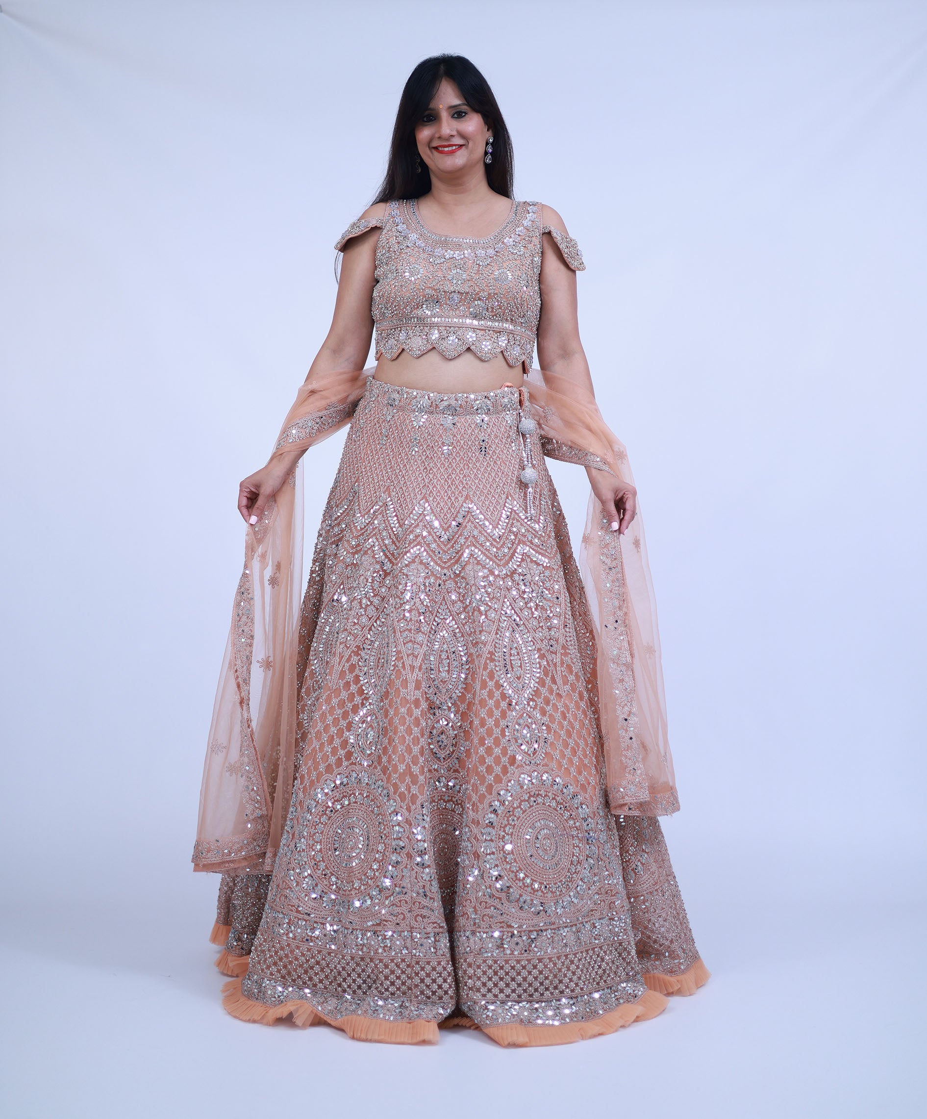 Pastel Peach Lehenga with real mirror work