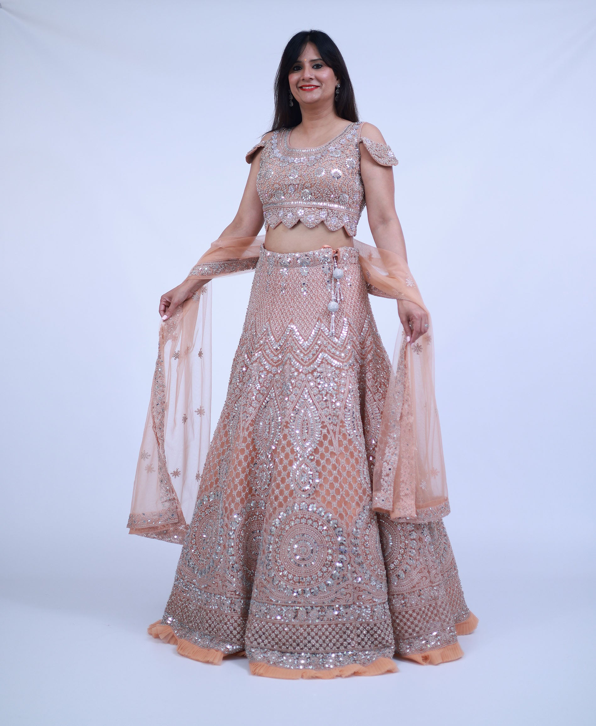 Pastel Peach Lehenga with real mirror work