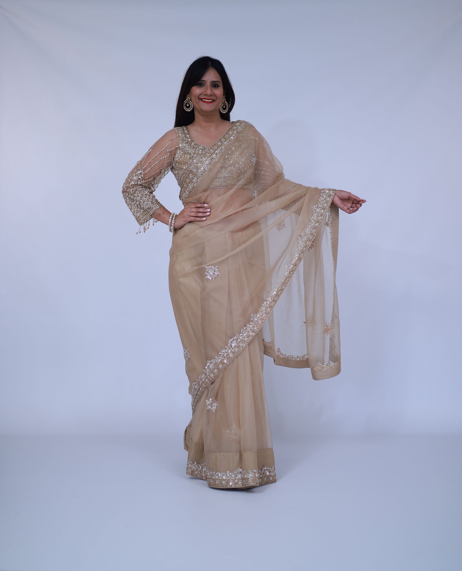 Beige organza saree with designer blouse