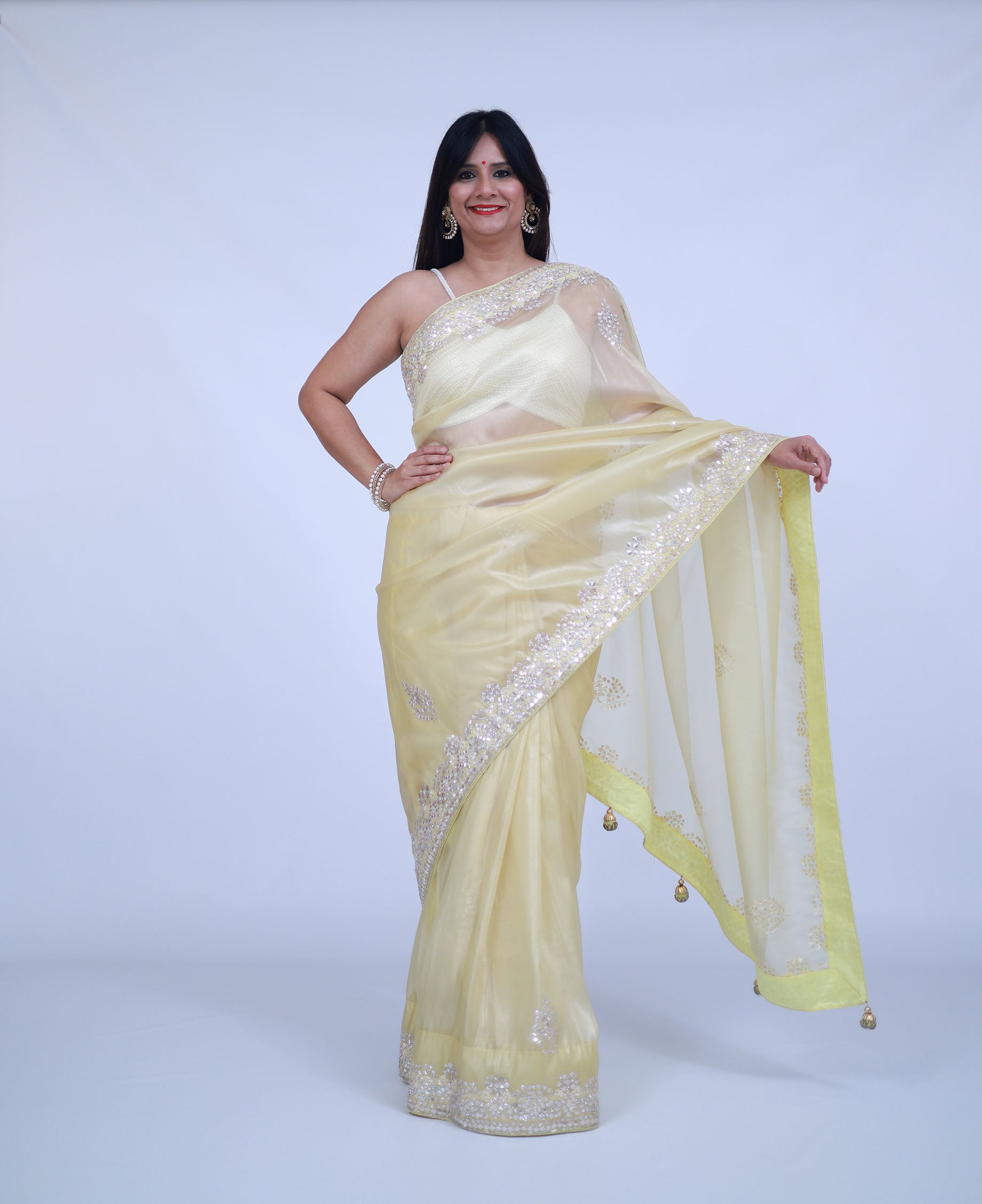 Pastel Lemon Yellow Organza Saree with unstitched blouse