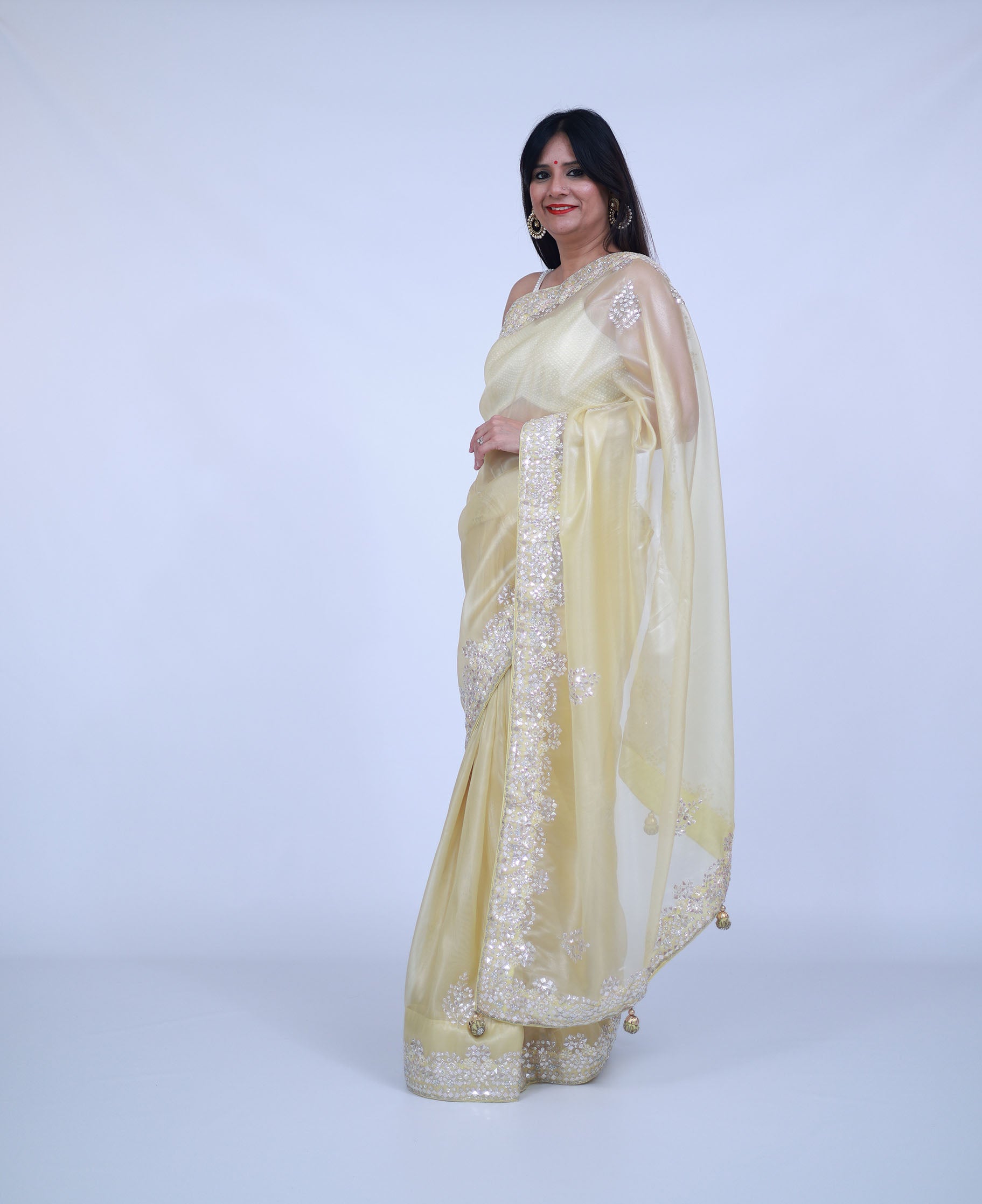 Pastel Lemon Yellow Organza Saree with unstitched blouse