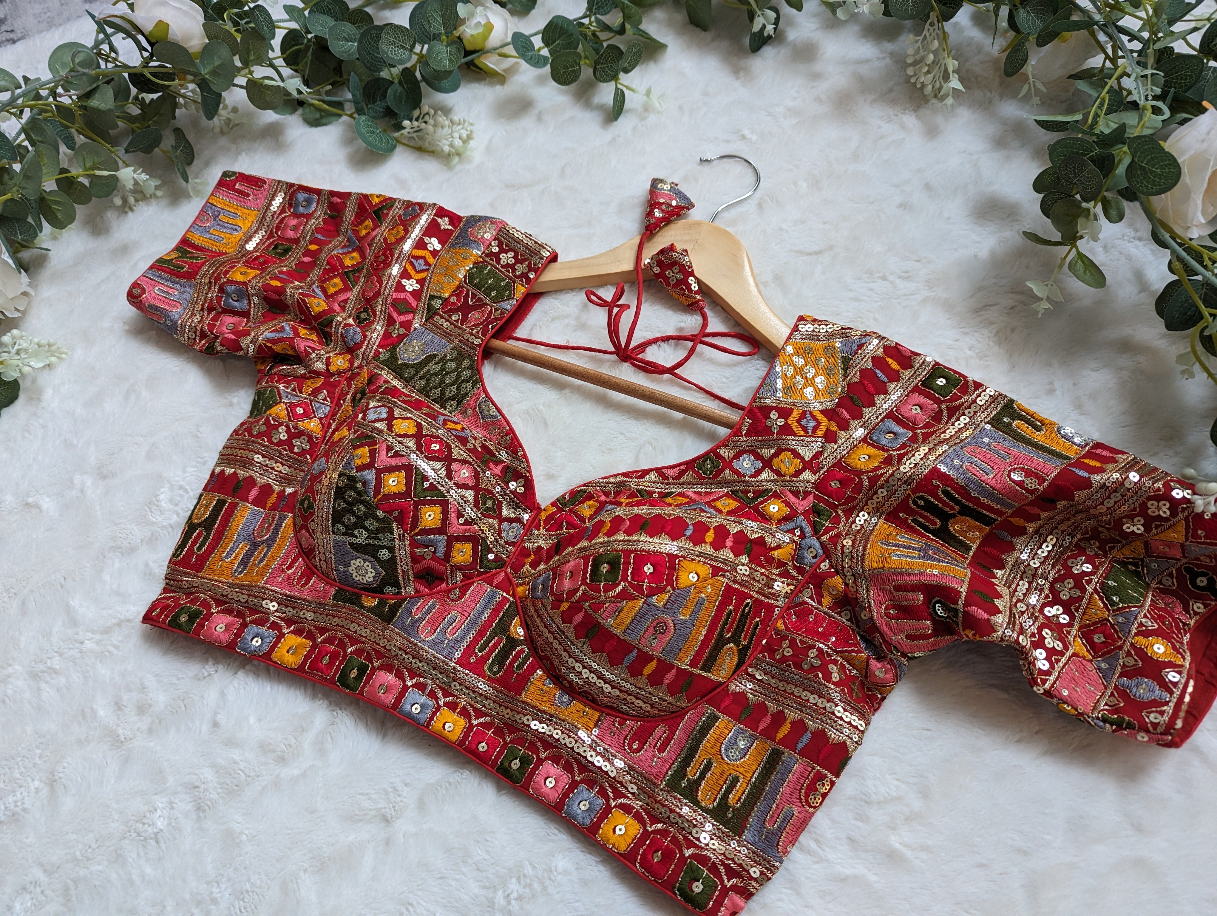 Red embroidered blouse